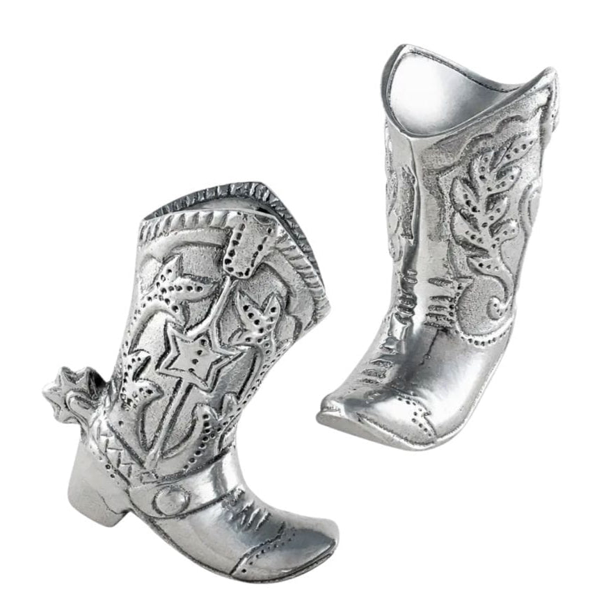 A pair of metallic silver cowboy boots with embossed western-style stitching and decorative details, shown on a plain white background.