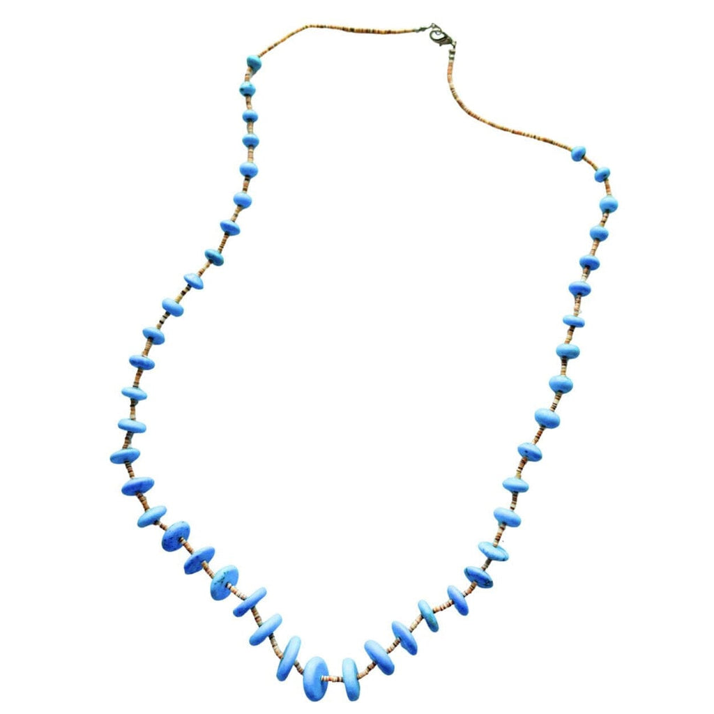 Bright blue round block turquoise beads, showcasing the vibrant color and texture of the Southwestern-style stones.