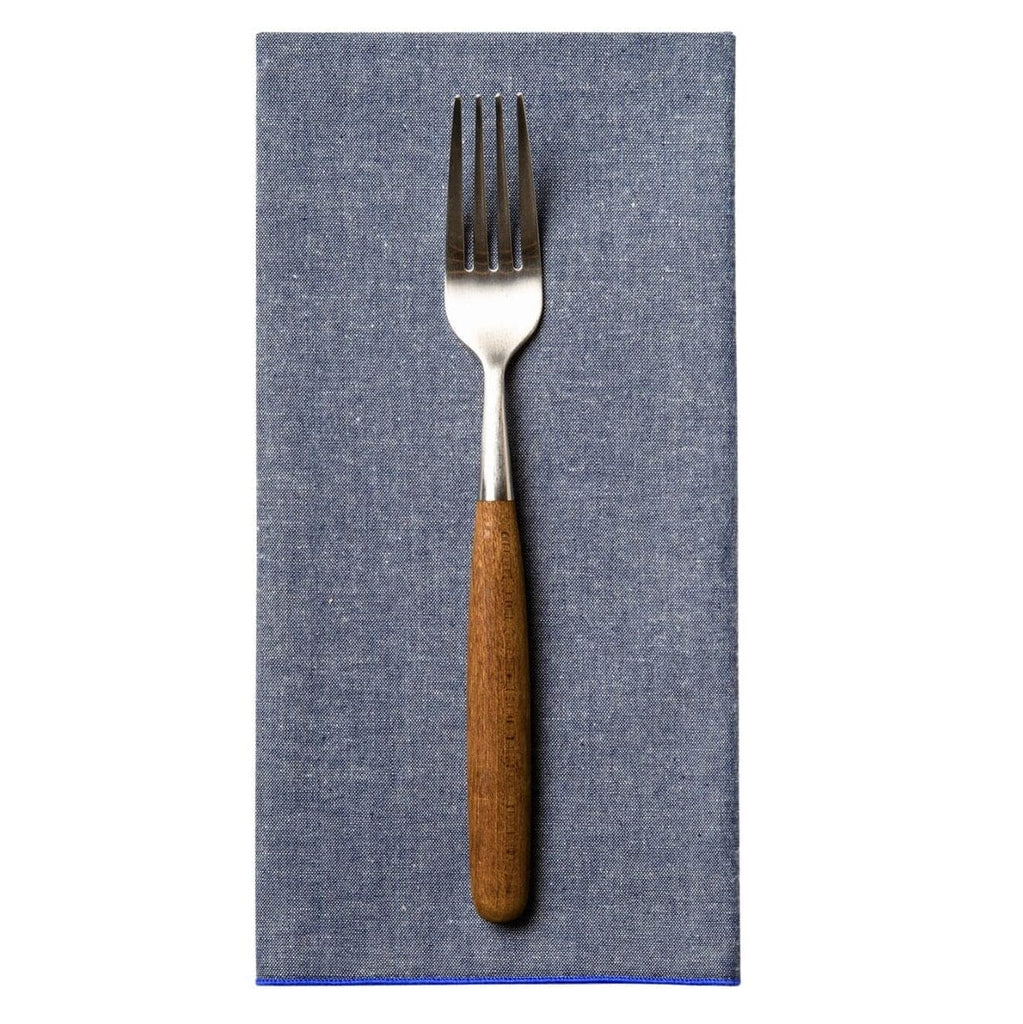 Blue Chambray Napking with Fork on White Background