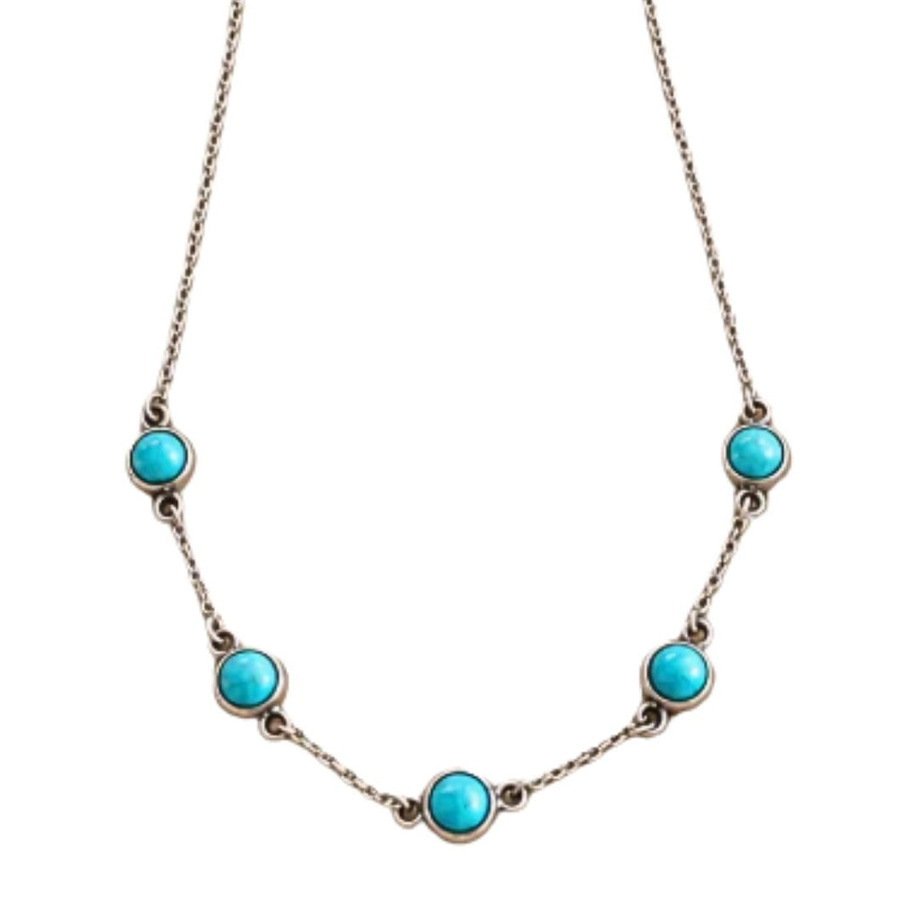 A silver-toned chain necklace featuring five evenly spaced round turquoise-blue cabochon stones, displayed against a solid white background.