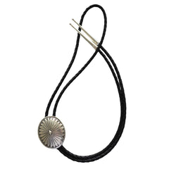 Handcrafted sterling silver concho bolo tie with black leather cord and silver tips