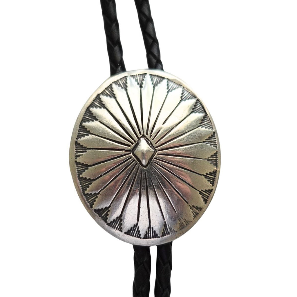 Handcrafted sterling silver concho bolo tie with black leather cord and silver tips