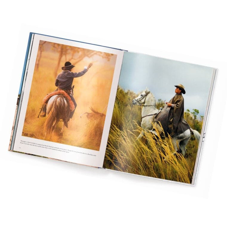 An open book spread showing two western-themed photographic pages. The left page has a warm, dusty scene with a cowboy on a horse, and the right page shows a cowboy riding a white horse through tall grass under a cloudy sky.