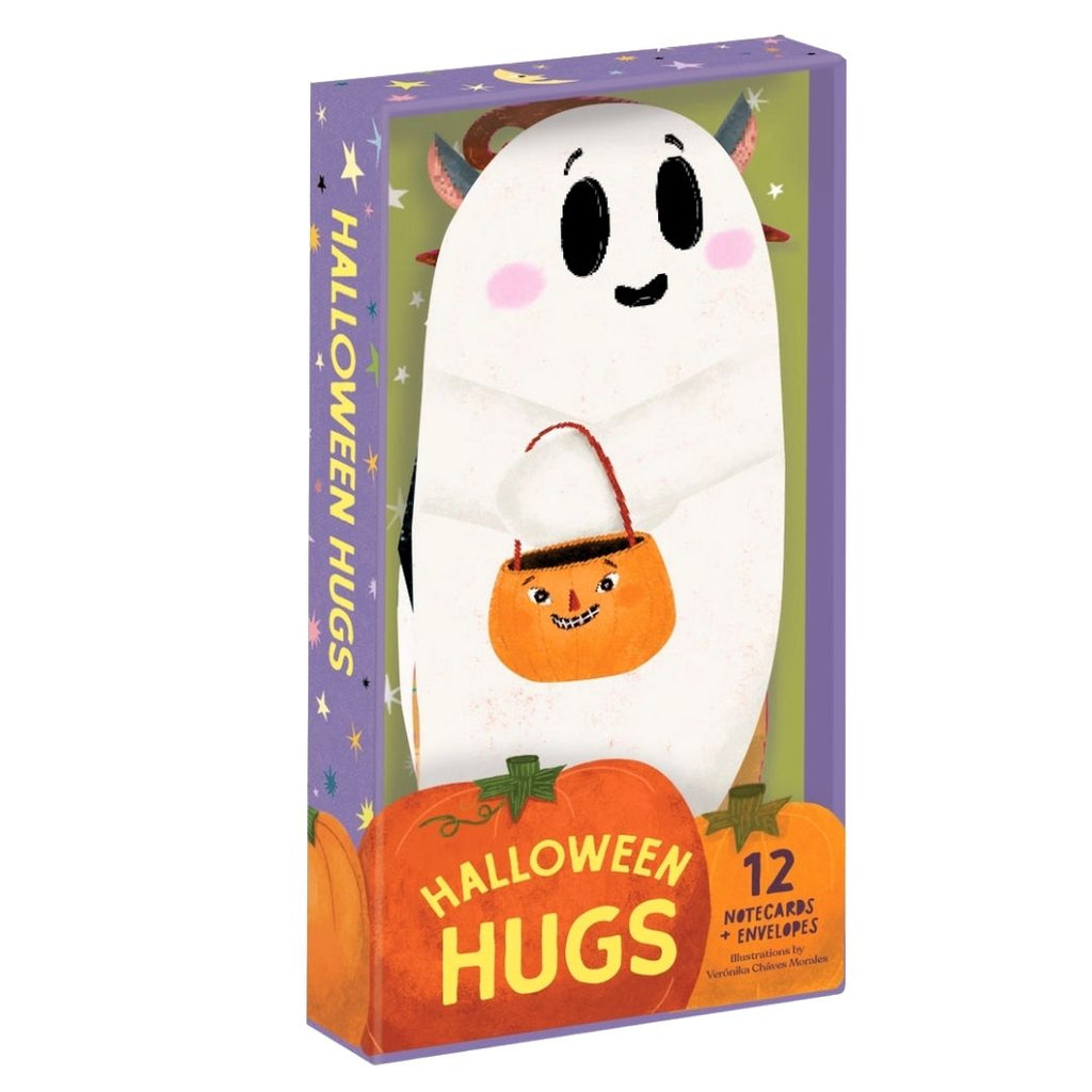 Halloween Hugs product box featuring a cute ghost character holding an orange pumpkin bucket, with pumpkins and stars on a purple package. Text reads 'HALLOWEEN HUGS' and '12 NOTECARDS + ENVELOPES'.