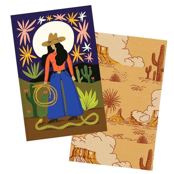 Two illustrated cards or art prints overlapping on a white background. The front card shows a stylized woman in a cowboy hat and boots holding a lasso, with a desert landscape, cacti, and a dark blue starry sky.
