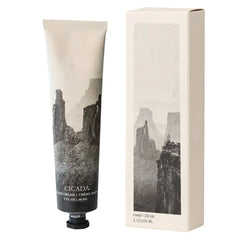 Cicada Hand Cream 2 fl oz tube and matching outer box, both featuring a black and white canyon landscape graphic on a cream background.