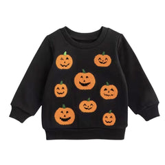 A black long-sleeve crewneck sweatshirt featuring a playful pattern of orange knitted jack-o'-lantern pumpkins with green stems, displayed on a clean white background.