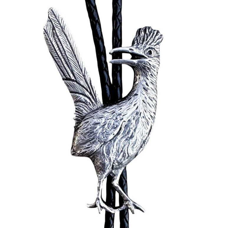 A silver roadrunner bolo tie on a black braided cord against a plain white background.