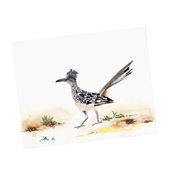 A watercolor-style art print depicting a roadrunner bird standing on a small patch of ground, shown against a plain white background.