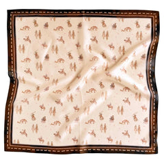 A square silk scarf with a western-themed print of cowboys on horseback, featuring a cream background, brown and tan figures, and a dark brown border with faux-stitched detailing.