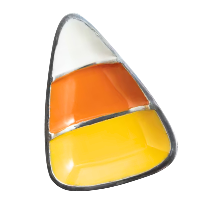 A triangular candy corn accessory with a silver-toned metal border, featuring horizontal stripes of white, orange, and yellow on a plain white background.