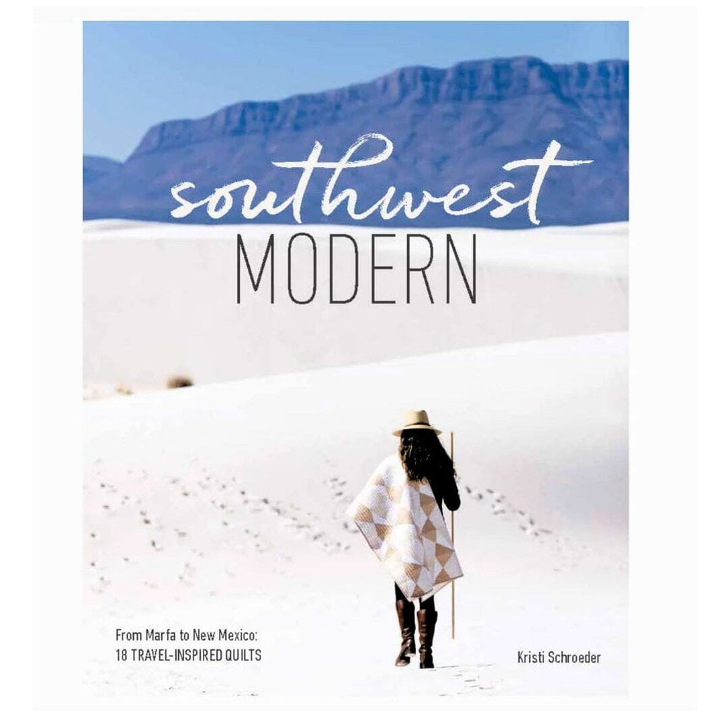 Book cover for 'southwest MODERN' by Kristi Schroeder, featuring a desert landscape with a person walking in white sand dunes under a blue sky.