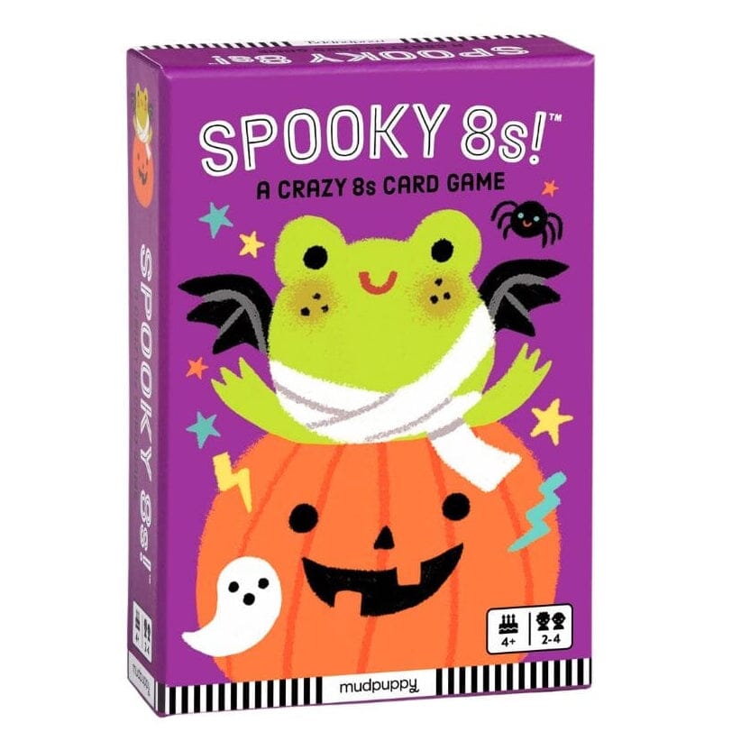 The product is a boxed card game titled 'Spooky 8s!' shown on a plain white background. The box is purple with a large green frog wearing black bat wings and a white bandage sitting on an orange jack-o'-lantern, plus small Halloween illustrations including stars, lightning, a ghost, and a spider.