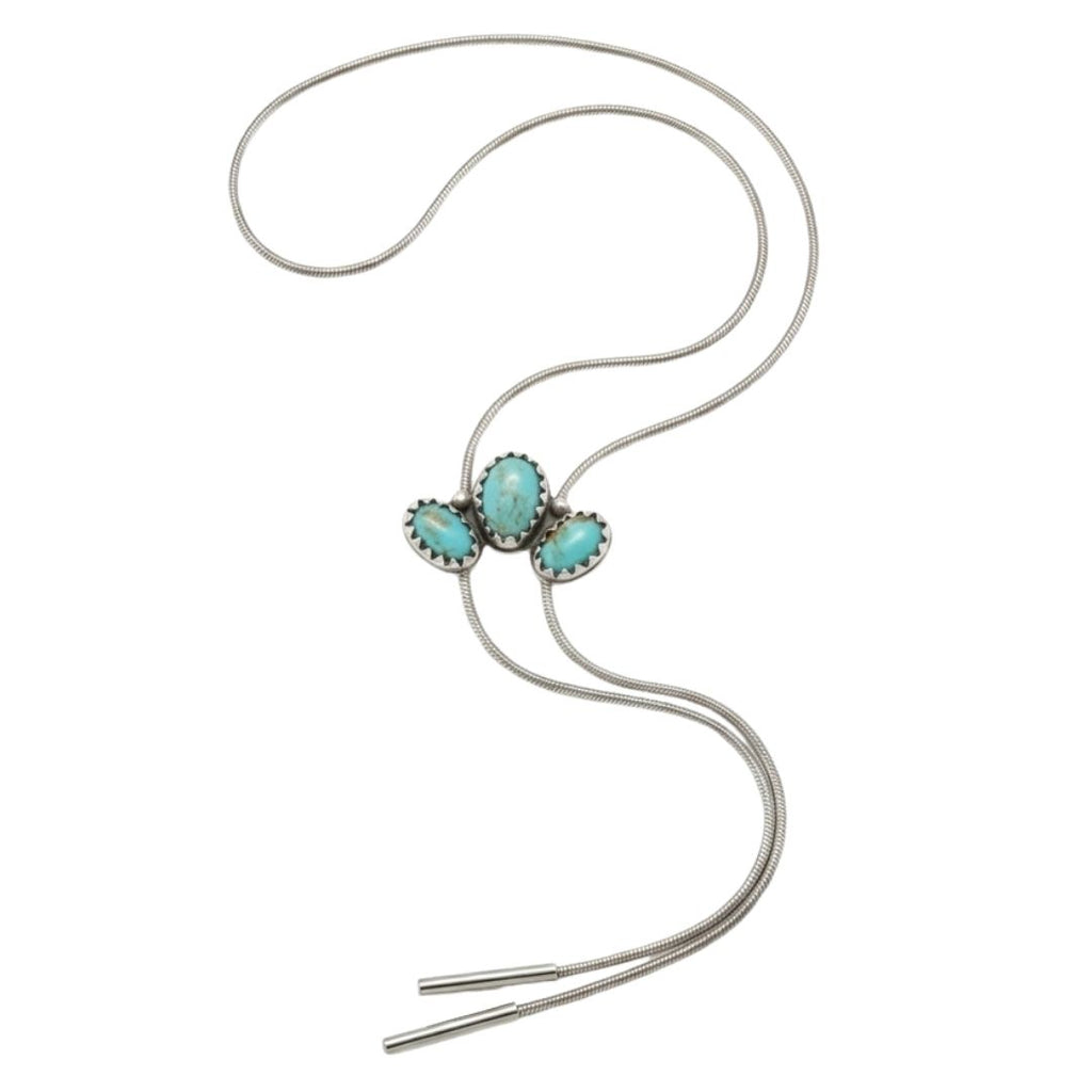 A silver lariat bolo tie necklace featuring three oval turquoise-colored stones in a cluster setting, displayed on a clean white background.