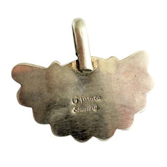 Turquoise Flower Pendant by Geraldine James