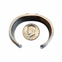 Crossed Arrows Cuff by Aaron Anderson