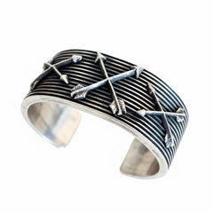 Crossed Arrows Cuff by Aaron Anderson