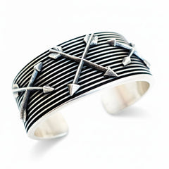 Crossed Arrows Cuff by Aaron Anderson