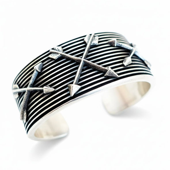 Crossed Arrows Cuff by Aaron Anderson