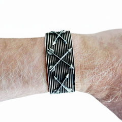 Crossed Arrows Cuff by Aaron Anderson