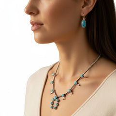 Squash Blossom Necklace & Earrings Set on Female Model