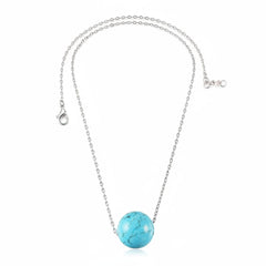 Turquoise Round Cut Necklace slung on sterling silver chain 